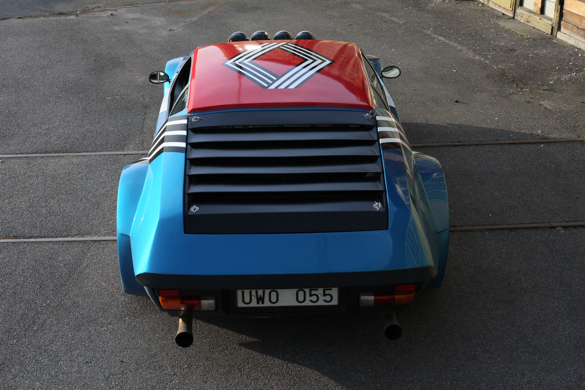 The Renault Alpine A310 from the behind with the fantastic Renault brand on the top 