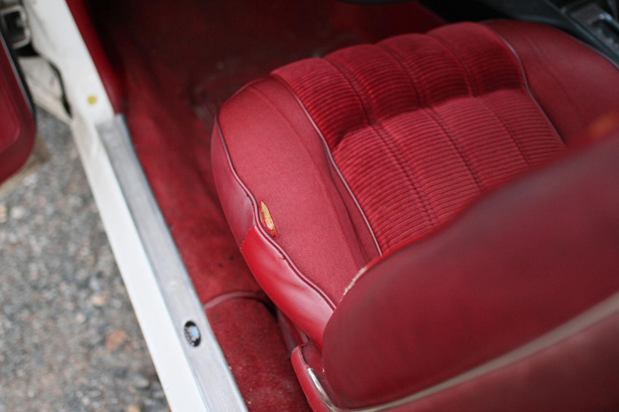 Driver seat is a bit worn in the pontiac