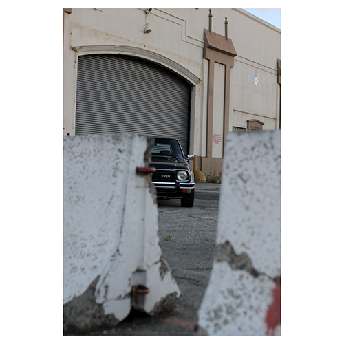 Honda-Civic-Cvcc-1978-Left-headlight-behind-concrete